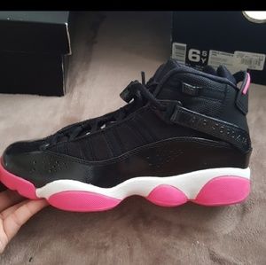 Pink and black jordans